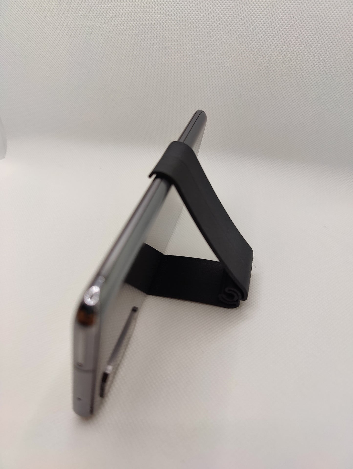 Mobilhållare i tre färger